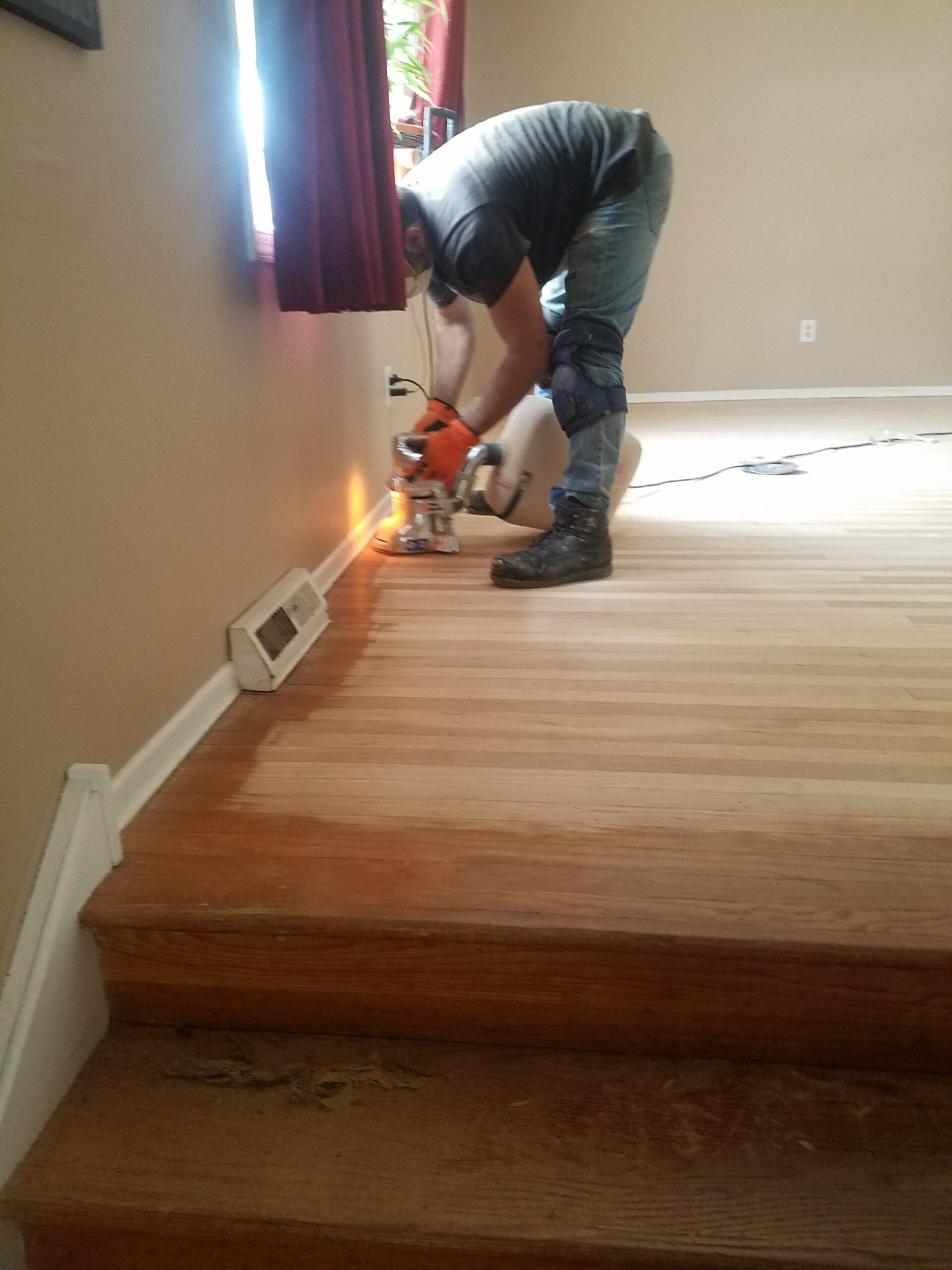 Expert installing laminate in room