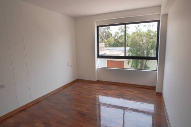 A showcase of our craftsmanship highlighting hardwood floors, transforming the room into a stylish and beautiful space.